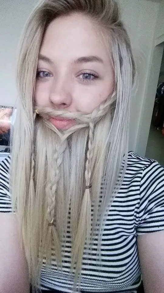 Women With Long Hair Braid Their Hair To Look Like A Beard